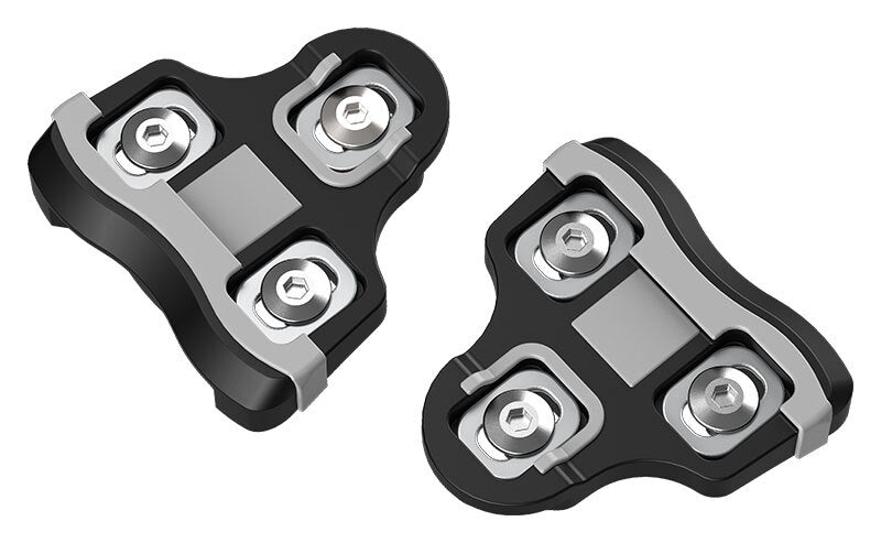 Two black and gray metal components on a white background