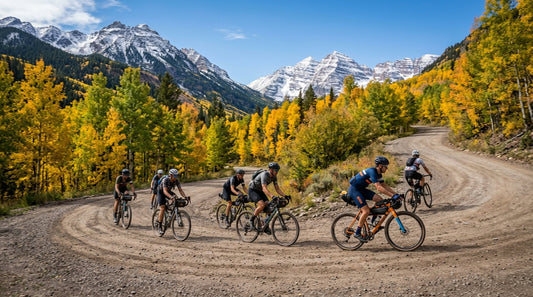 Gravel endurance cyclists riding along a mountain road in Colorado