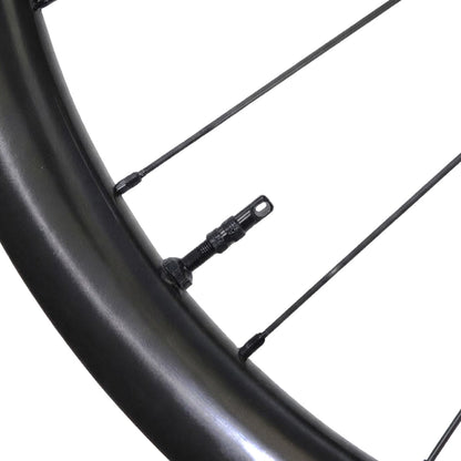 Summit SL42 42mm high-modulus carbon rim bed with pre-installed Silca Ultimate tubeless valve and tape